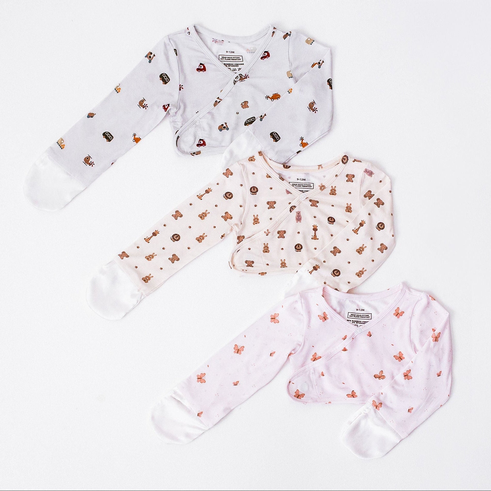 Baby outfit set with top, pants, and socks on a white background
