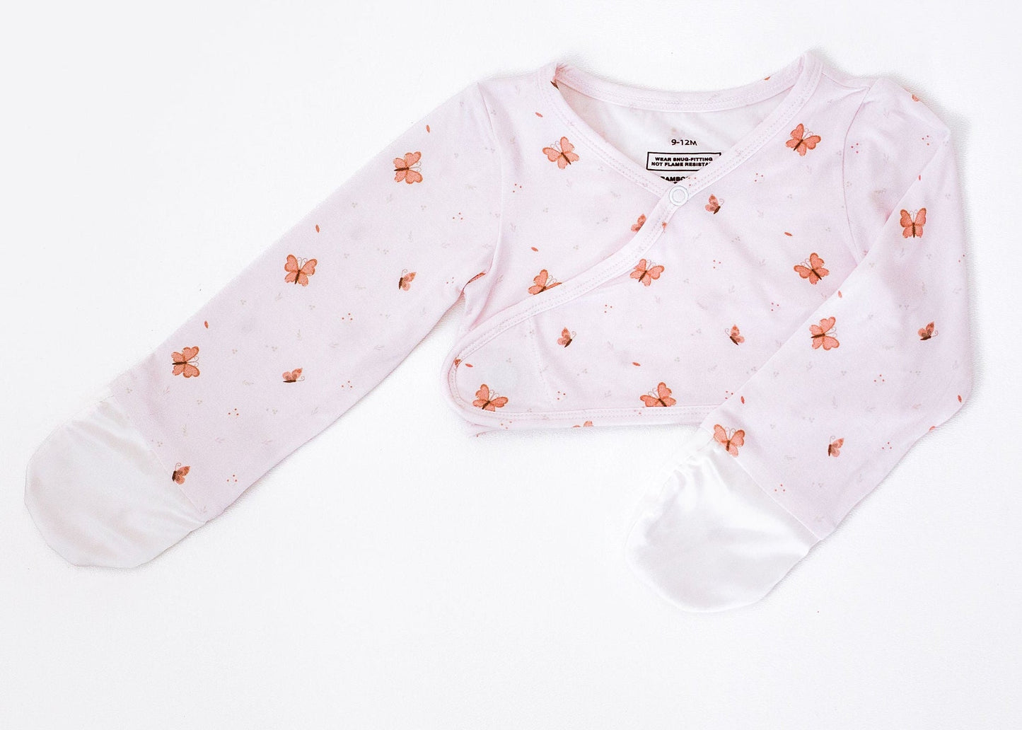 Baby cardigan with floral pattern on a white background